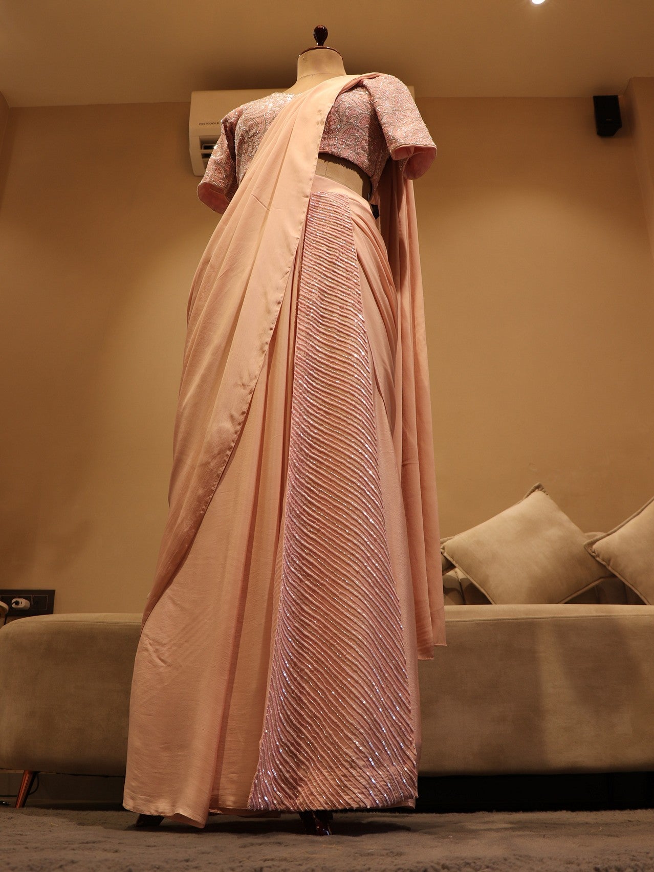 Peachish pink pre drape saree