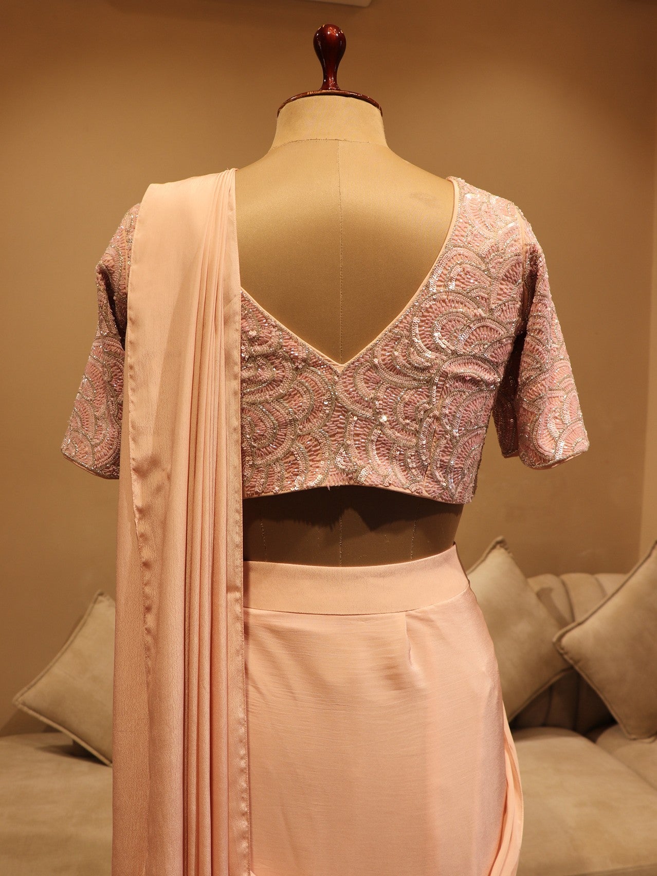 Peachish pink pre drape saree