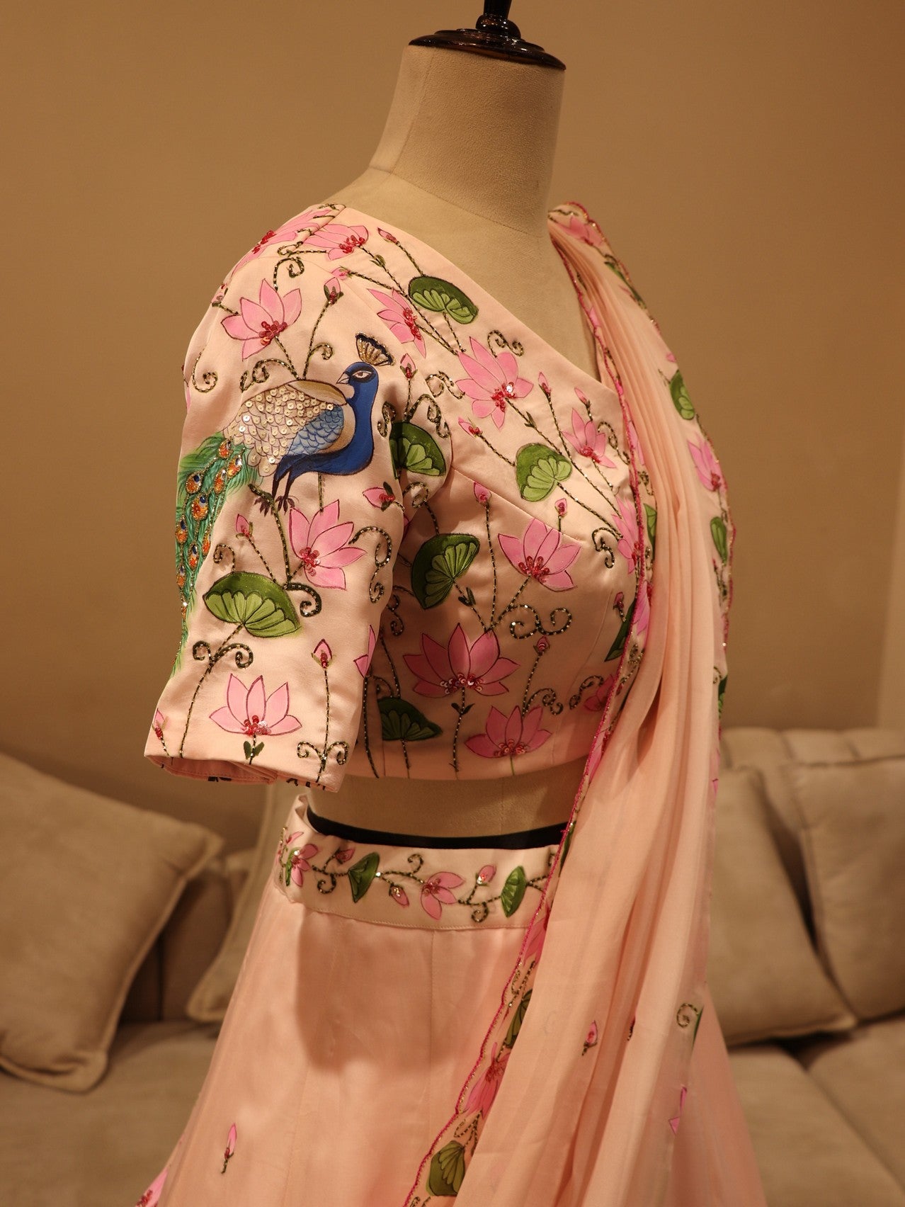 Pastel peach peacock hand painted lehenga set