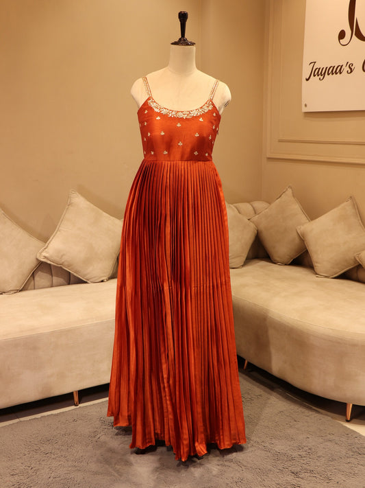 Deep rust orange  pleted gown