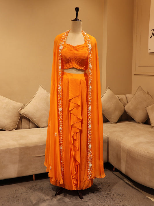 Rust orange cape with crop top skirt