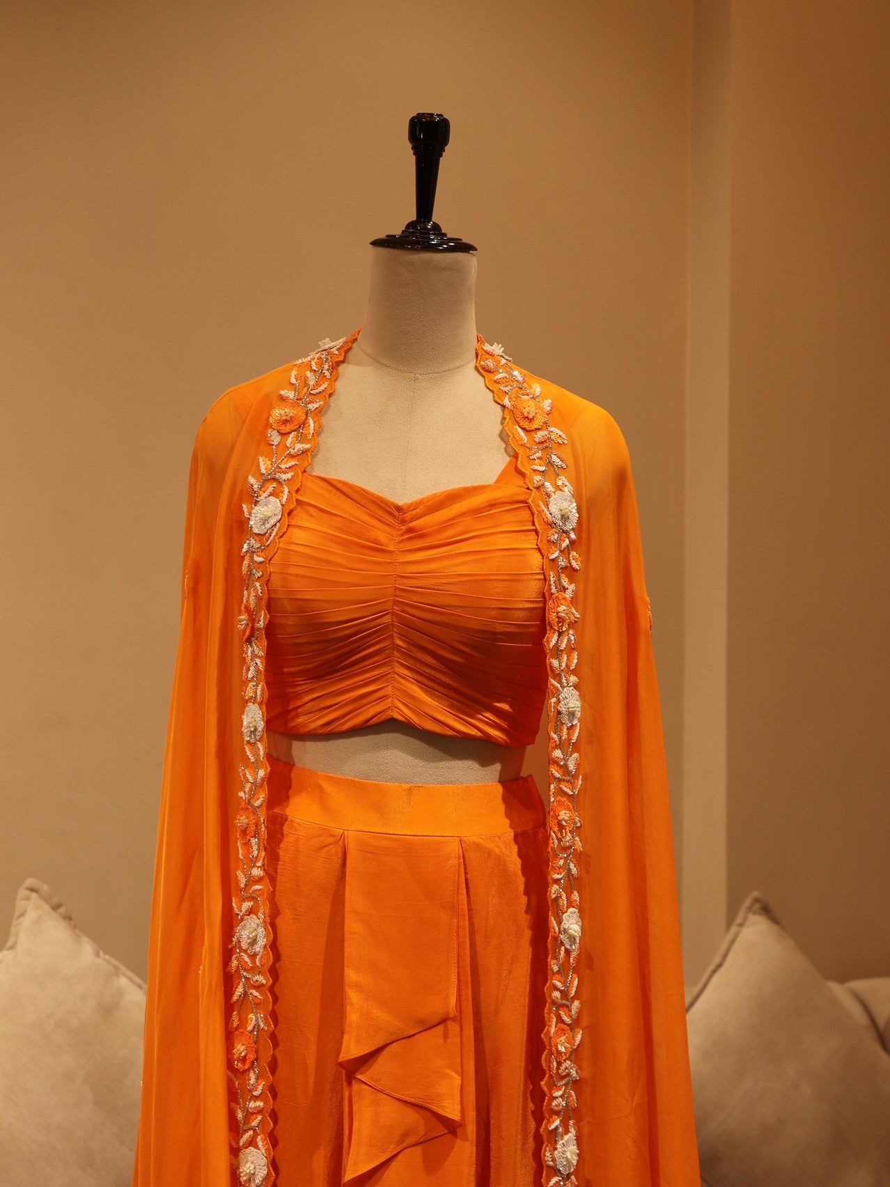Rust orange cape with crop top skirt