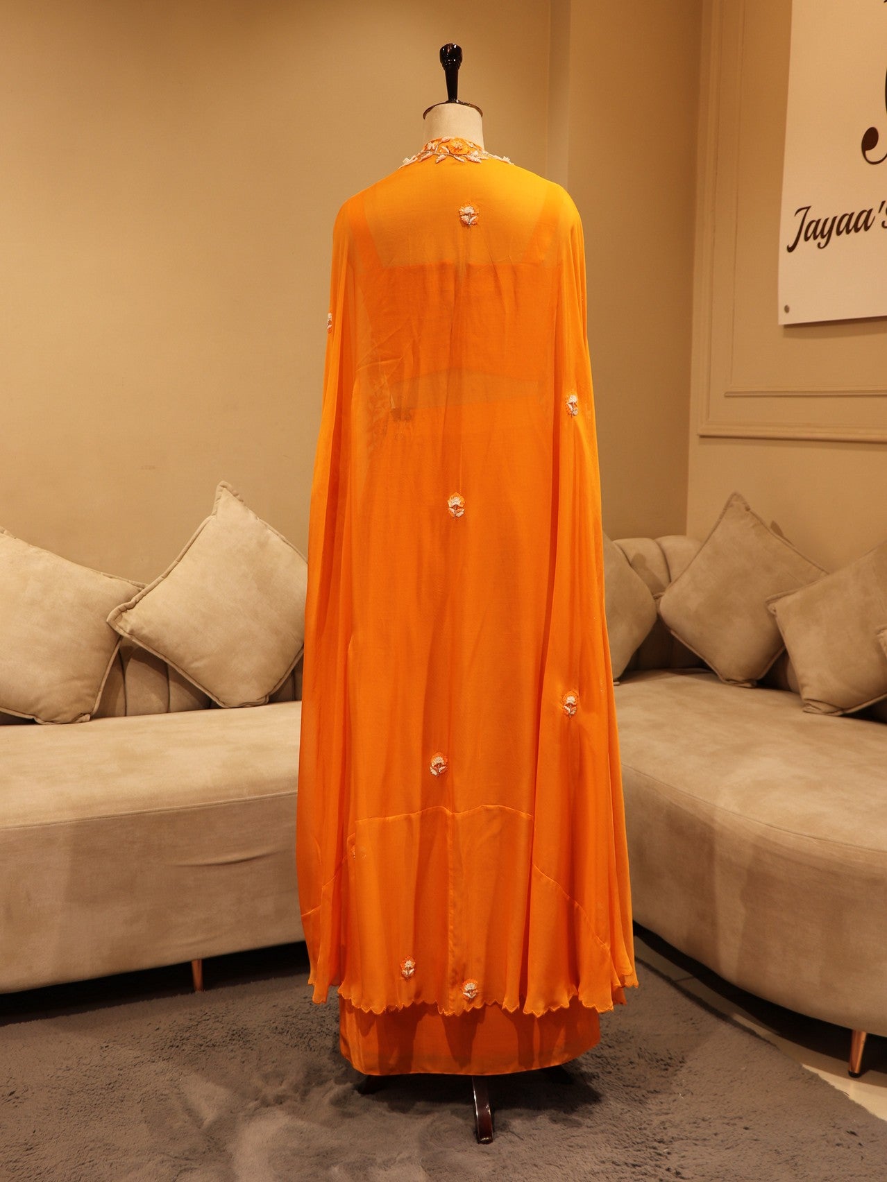 Rust orange cape with crop top skirt