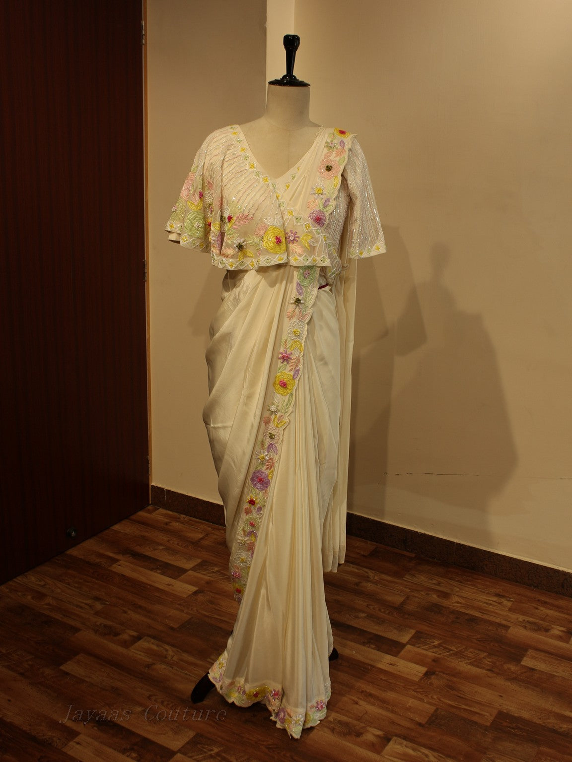 Off white saree with drape blouse