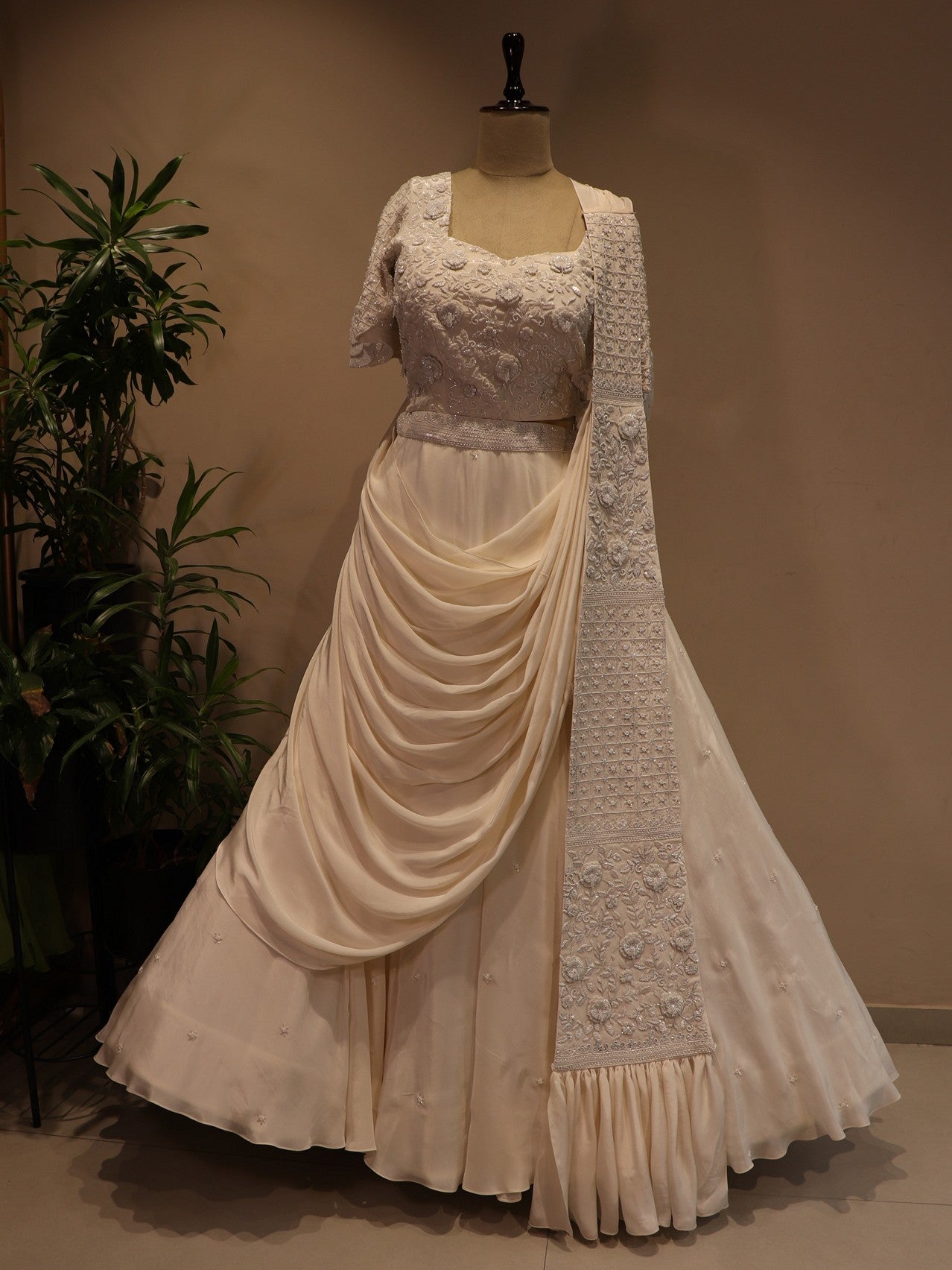 pearl white drape lehenga set