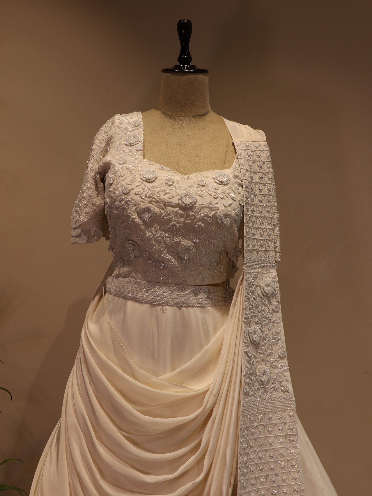 pearl white drape lehenga set