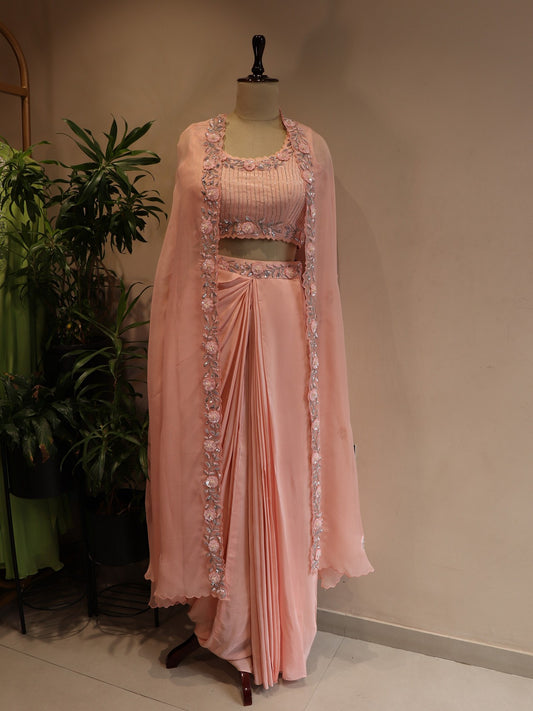 Peachish pink cape with top skirt