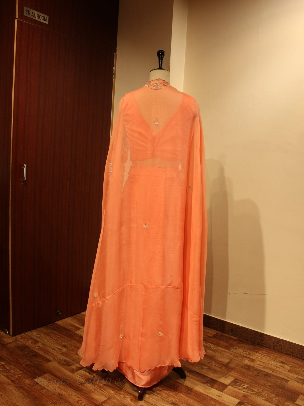 Peach crop top with drape skirt and cape