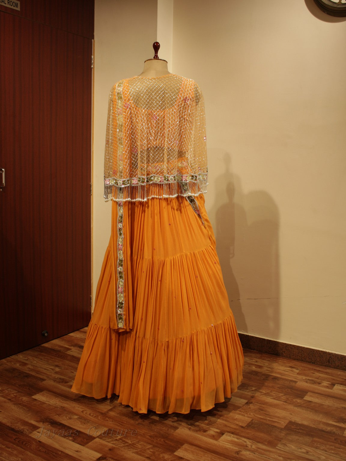 Orange lehenga set with cape