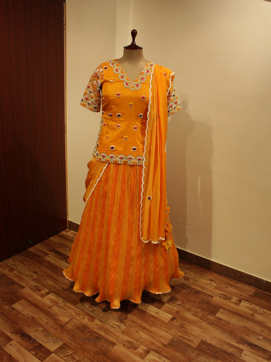 Rust orange kurti with crushed skirt and dupatta                                                                                                                skirt and  dupatta