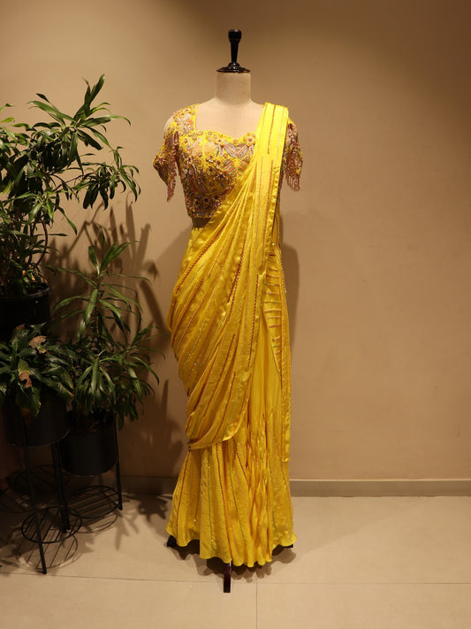 yellow embroidered drape saree