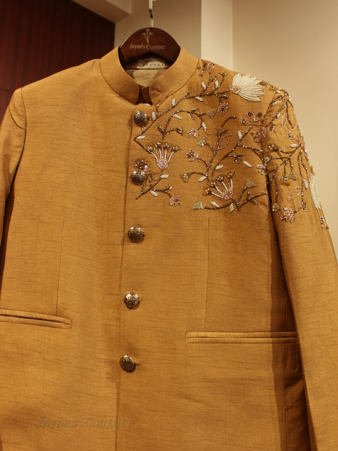 brown embroidered jacket with kurta and pants