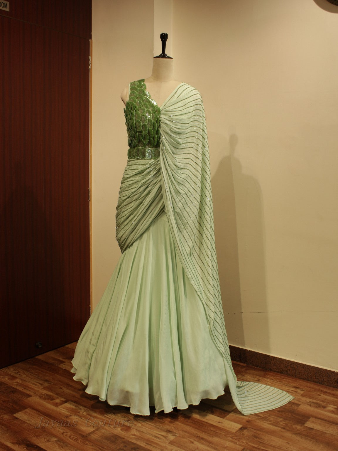 Green drape gown