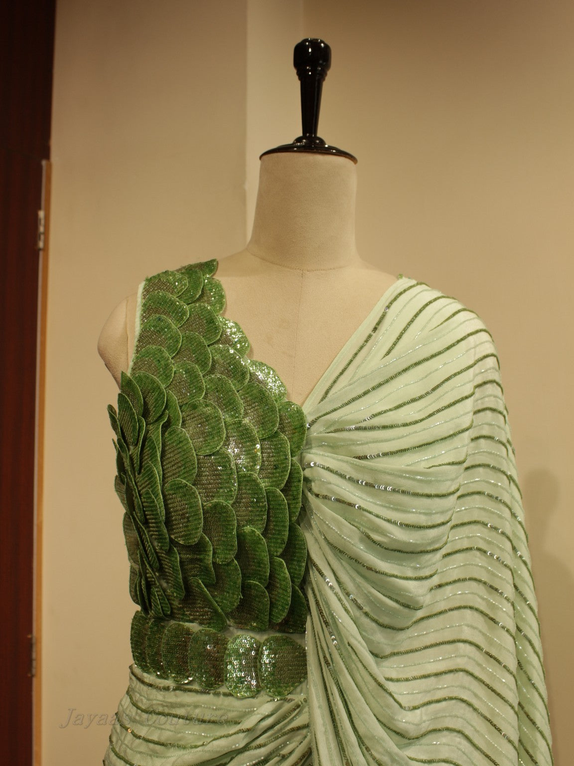 Green drape gown