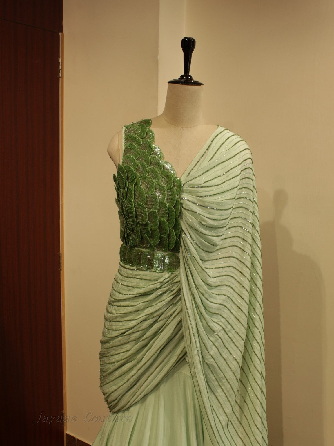 Green drape gown