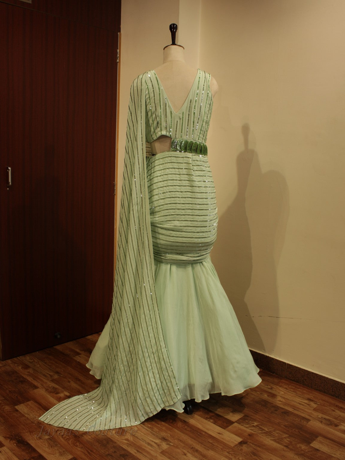 Green drape gown