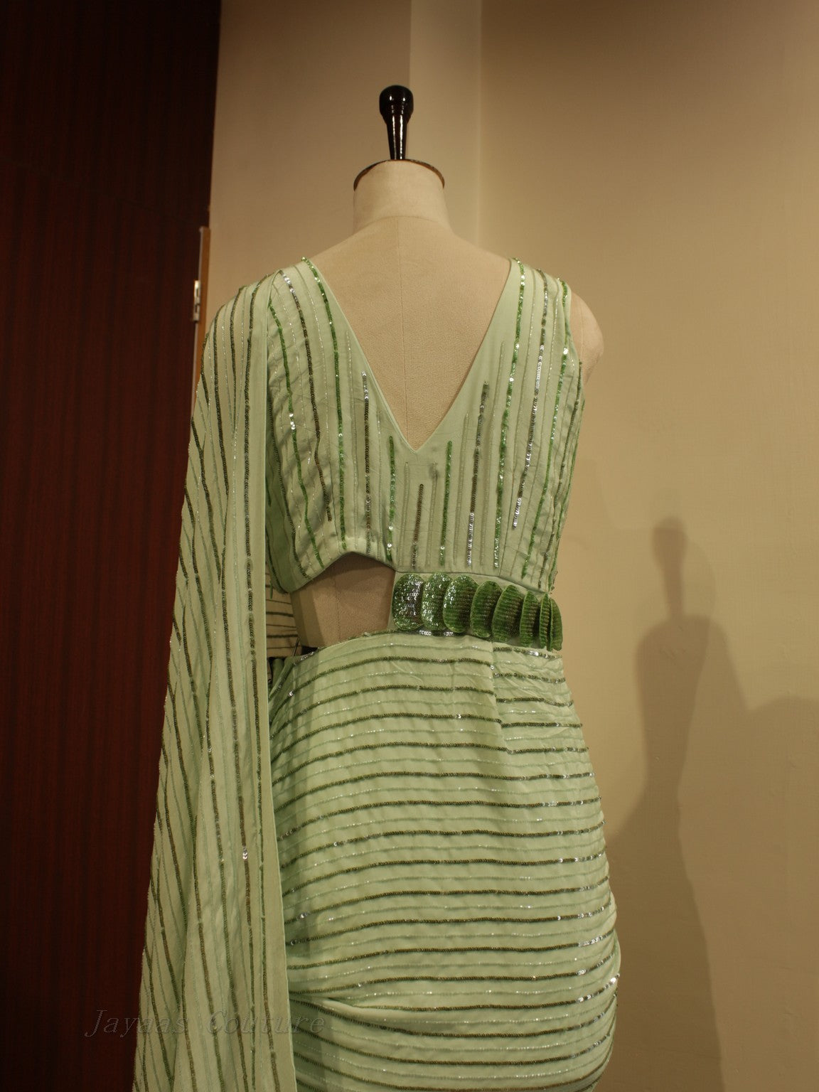 Green drape gown