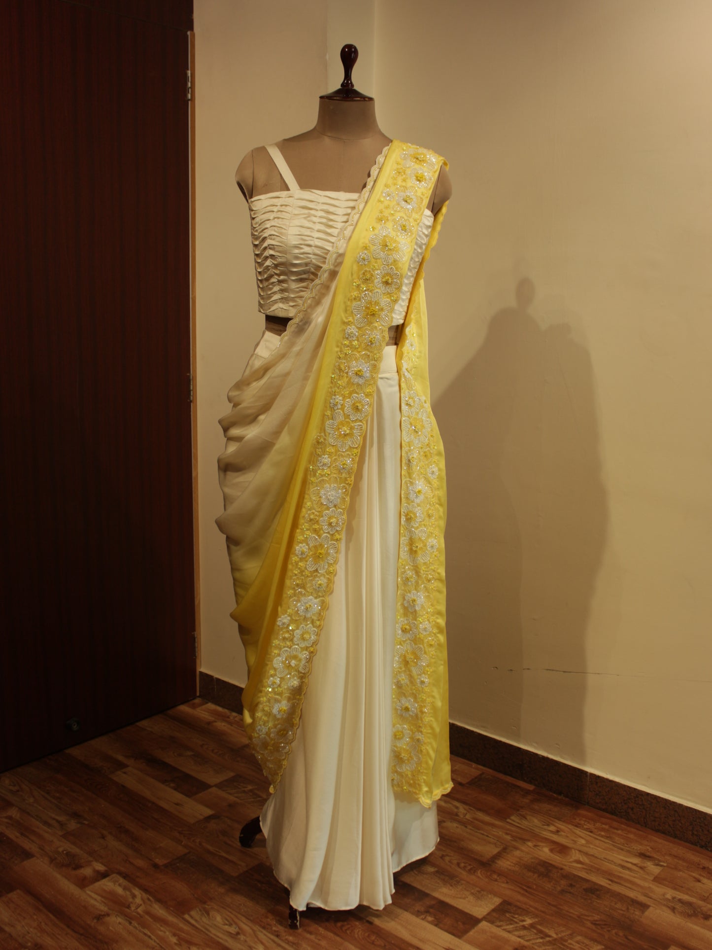 Off white yellow shaded drape saree