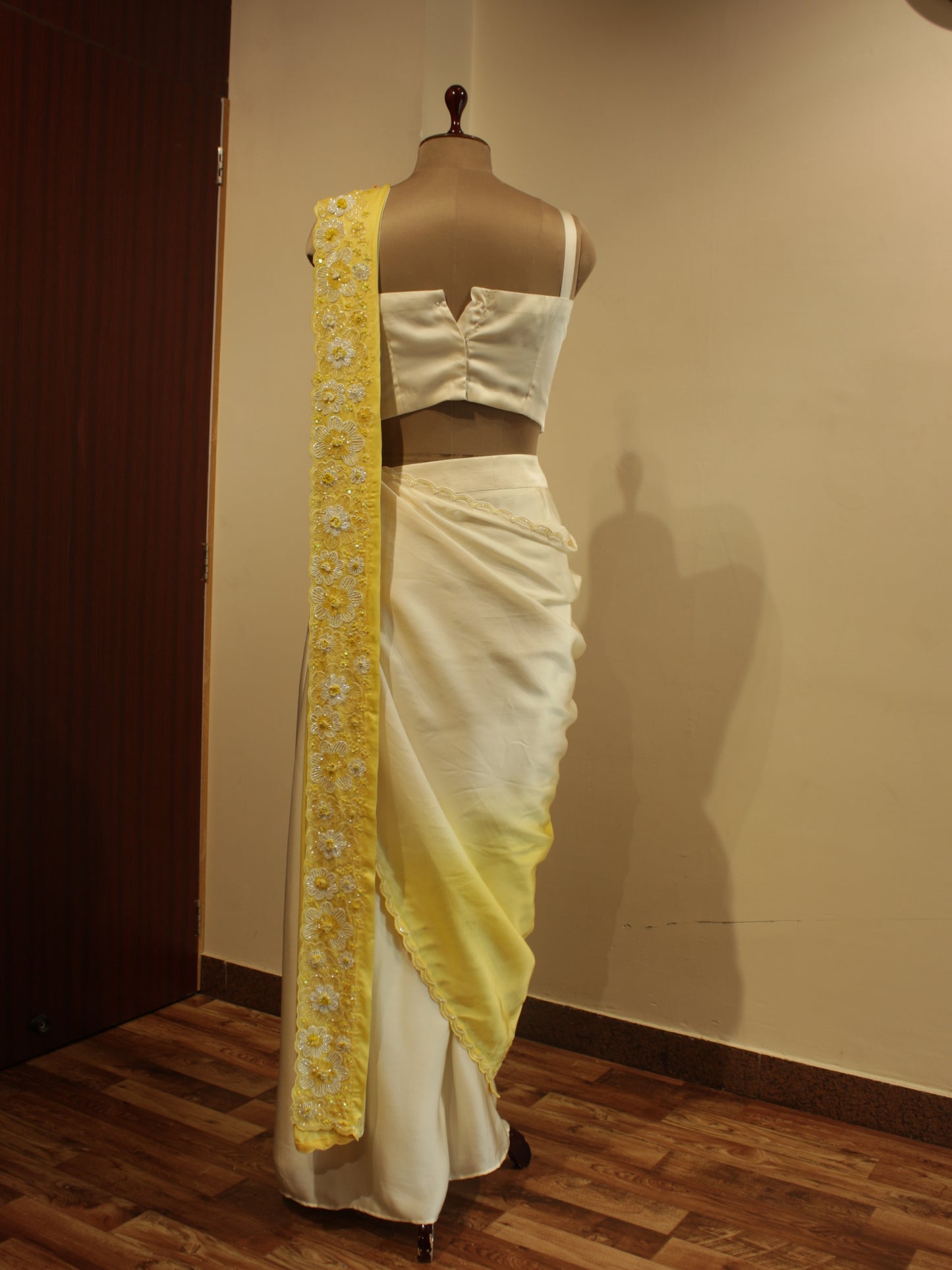 Off white yellow shaded drape saree