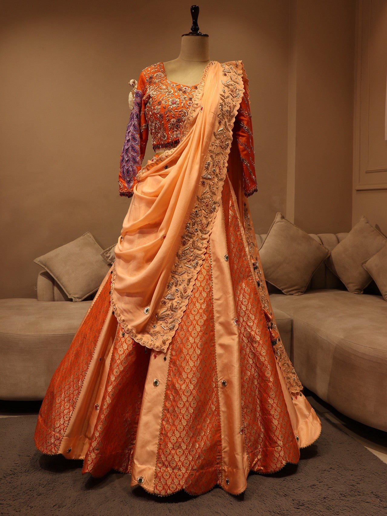 Peach rust orange peacock lehenga set