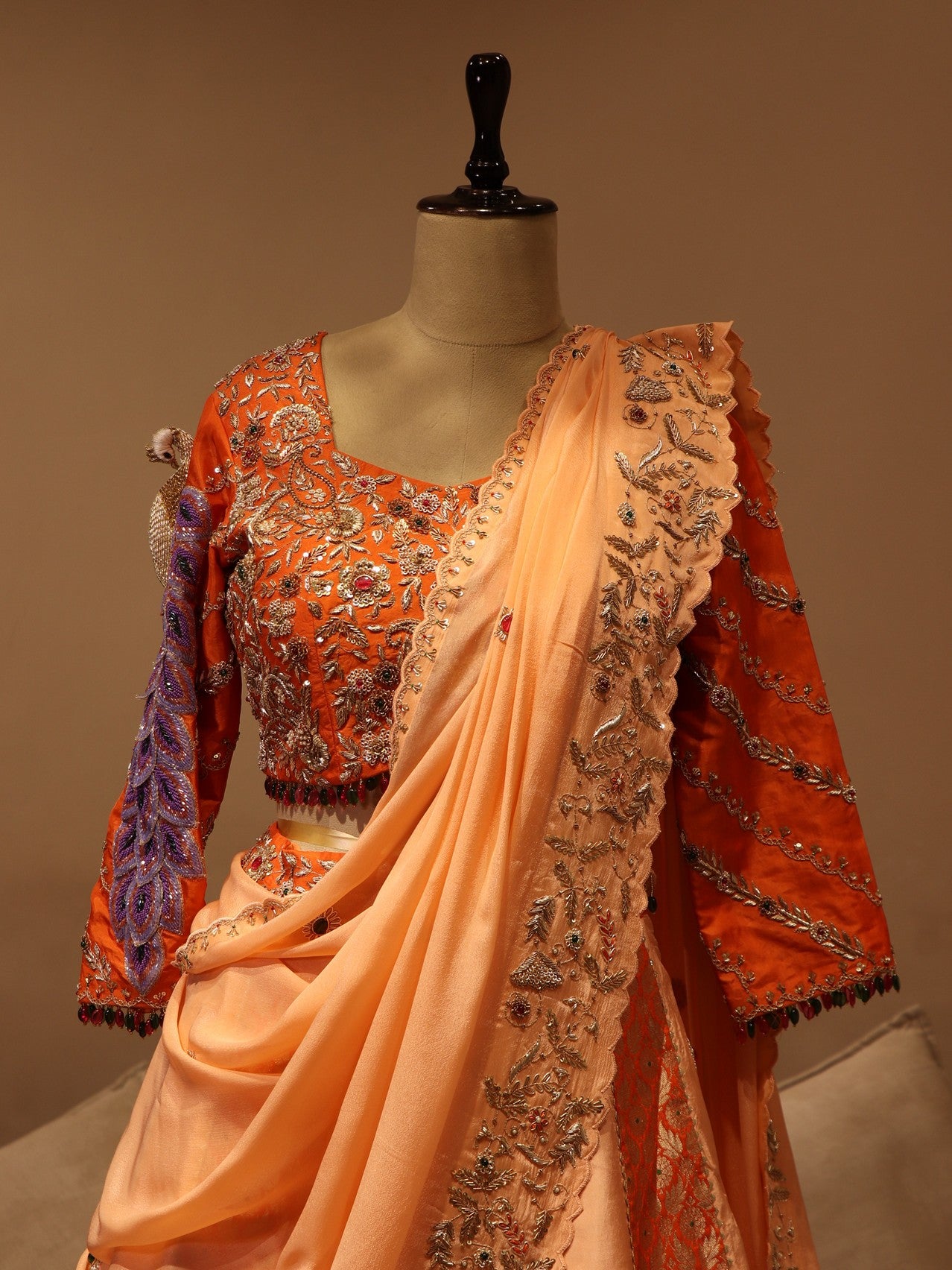 Peach rust orange peacock lehenga set
