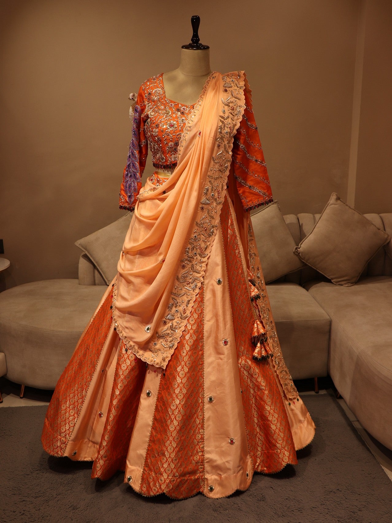 Peach rust orange peacock lehenga set