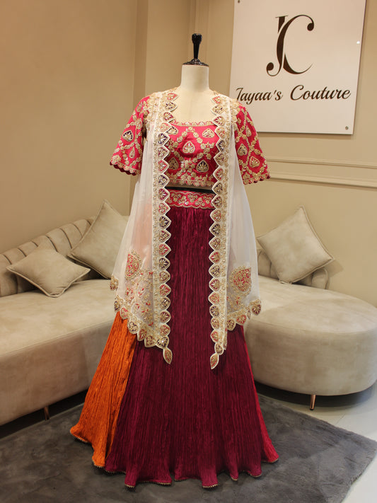 Rani orange crushed lehenga with cape