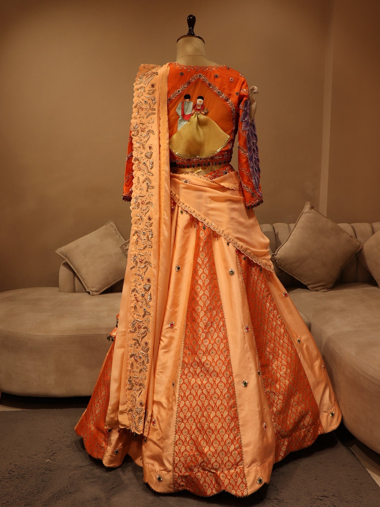 Peach rust orange peacock lehenga set