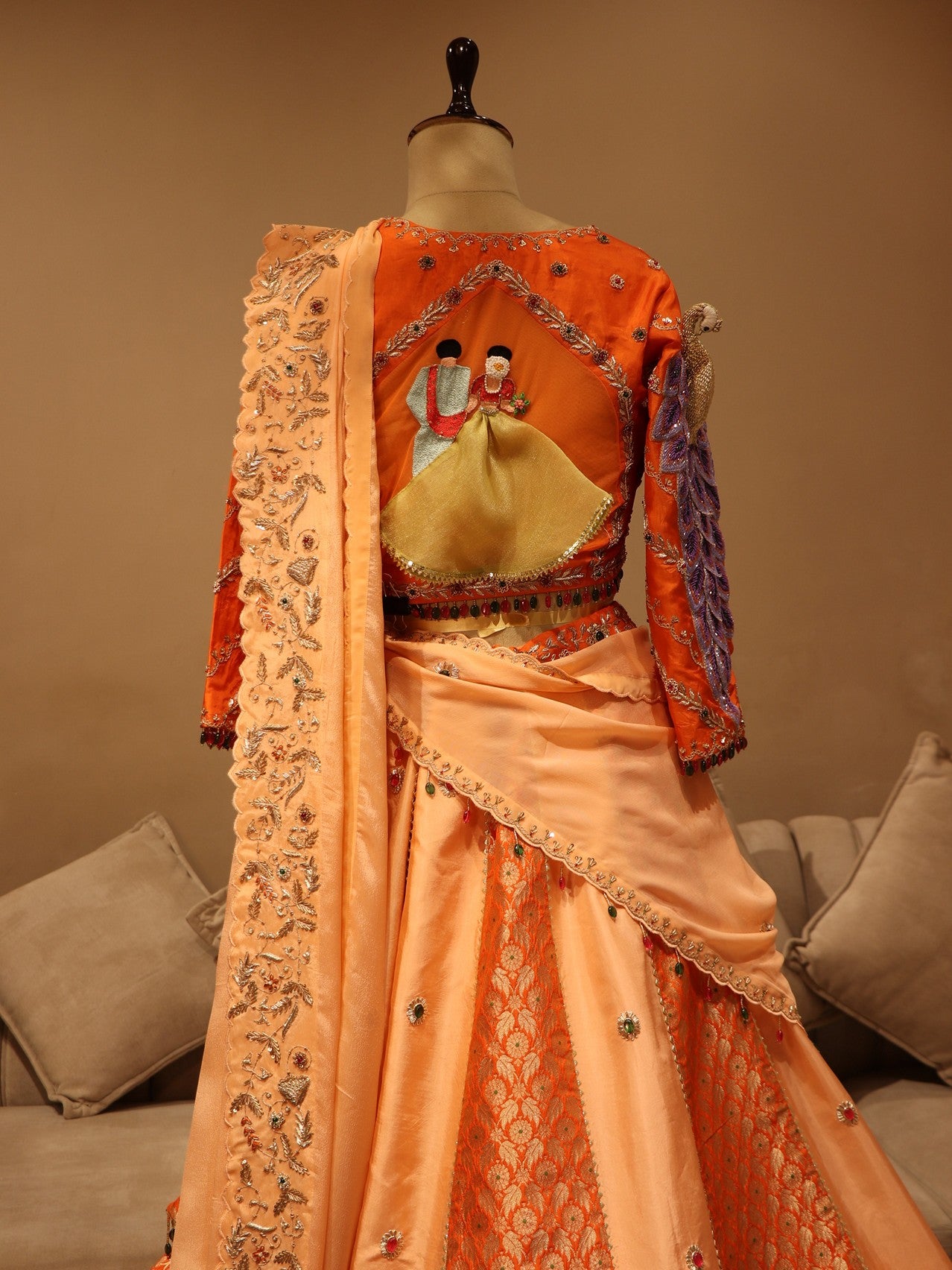 Peach rust orange peacock lehenga set