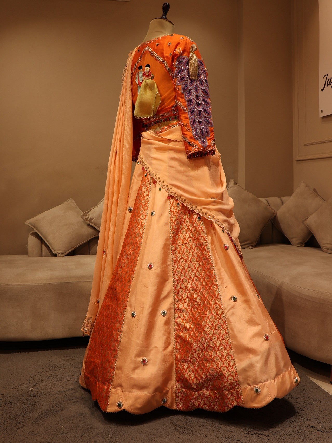 Peach rust orange peacock lehenga set