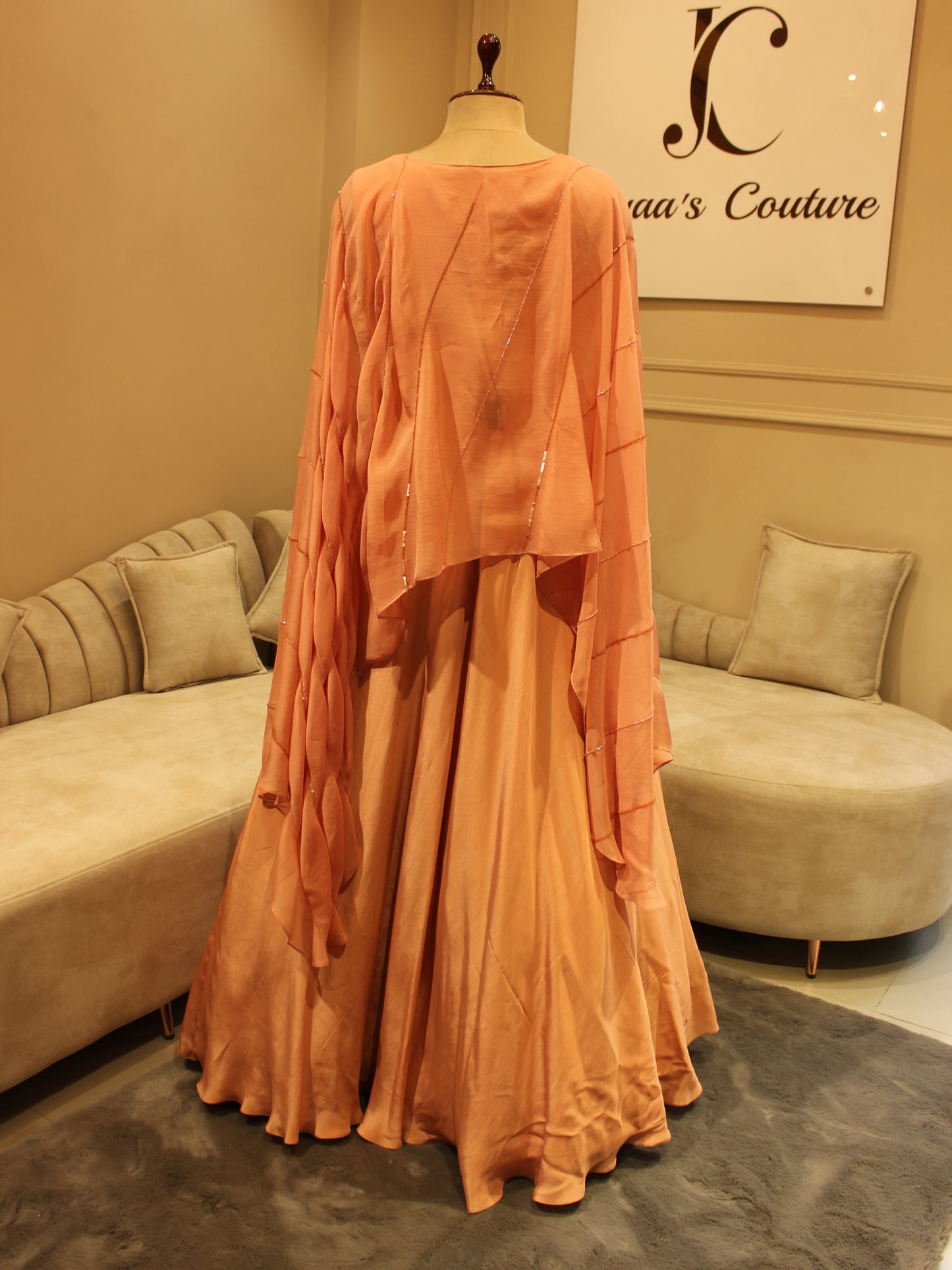 Peach drape cape gown