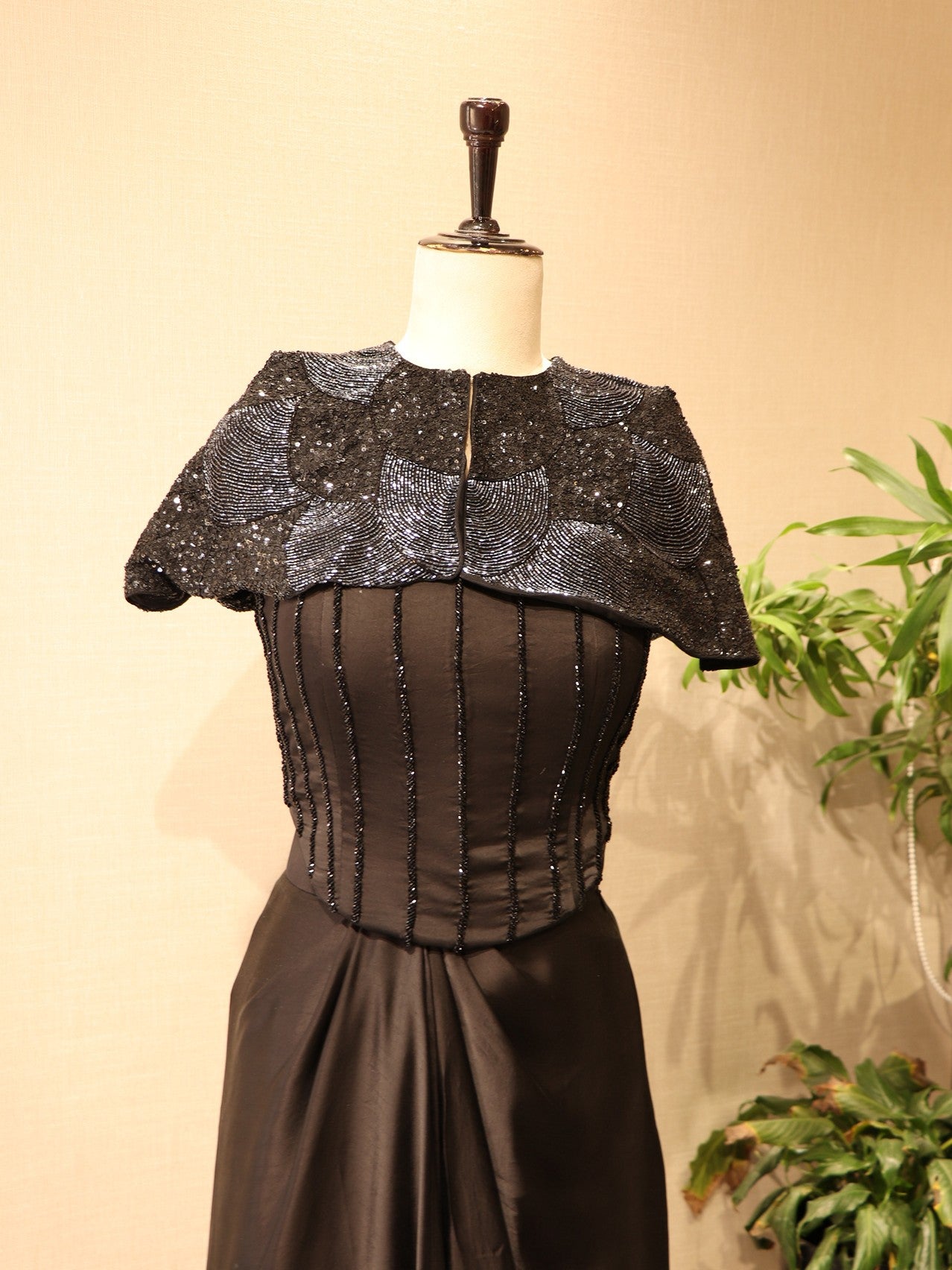 Black corset with cape skirt