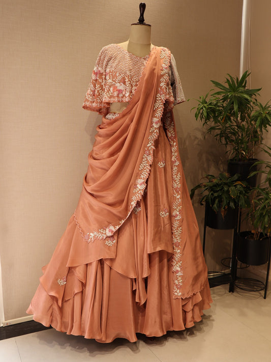 Peach cape drape lehenga set