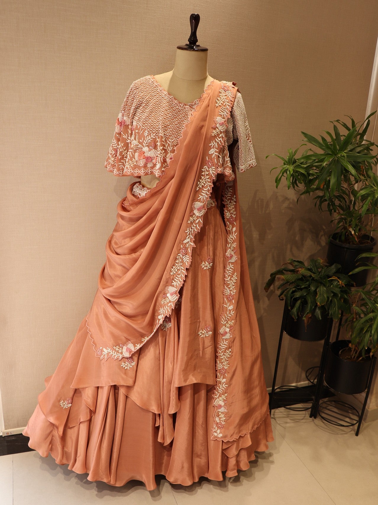 Peach cape drape lehenga set