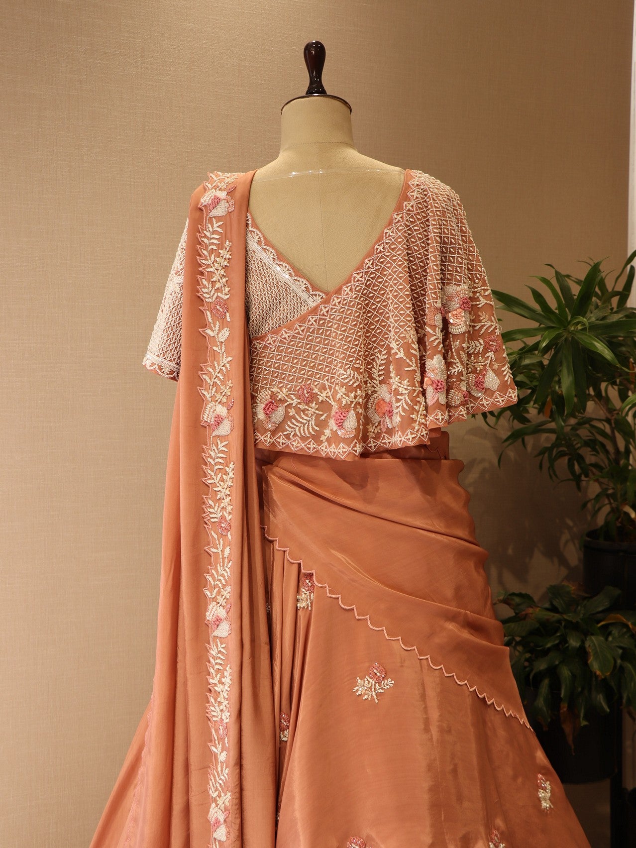 Peach cape drape lehenga set