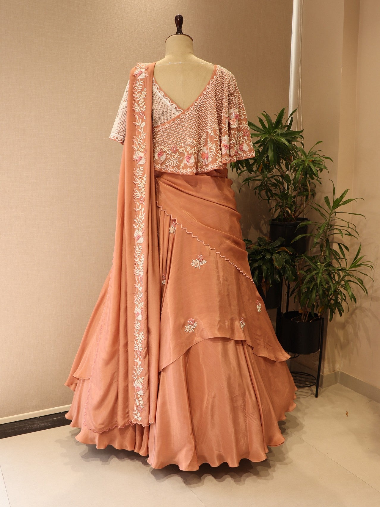 Peach cape drape lehenga set