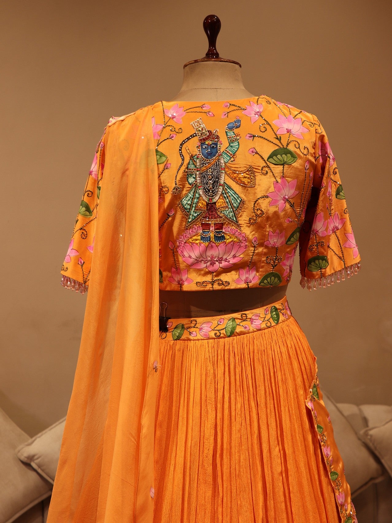 Rust orange shrinathji pichwai lehenga
