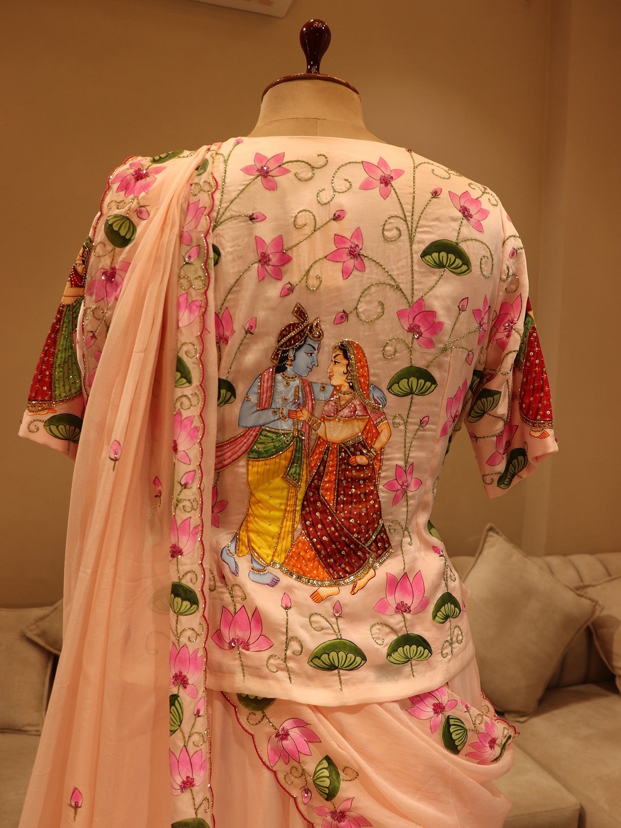 Blush pink hand painted pichwai radha kishan lehenga set