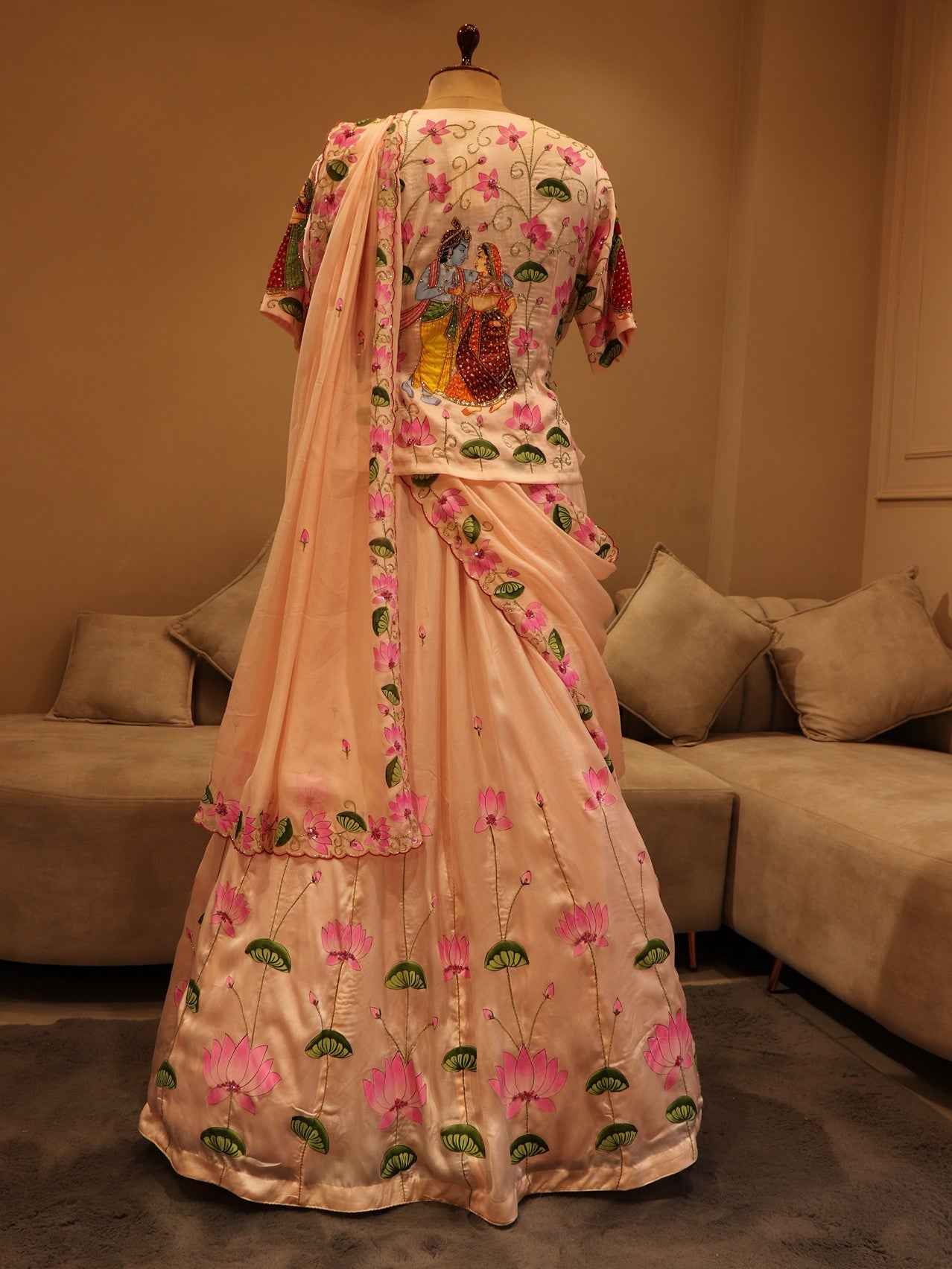 Blush pink hand painted pichwai radha kishan lehenga set