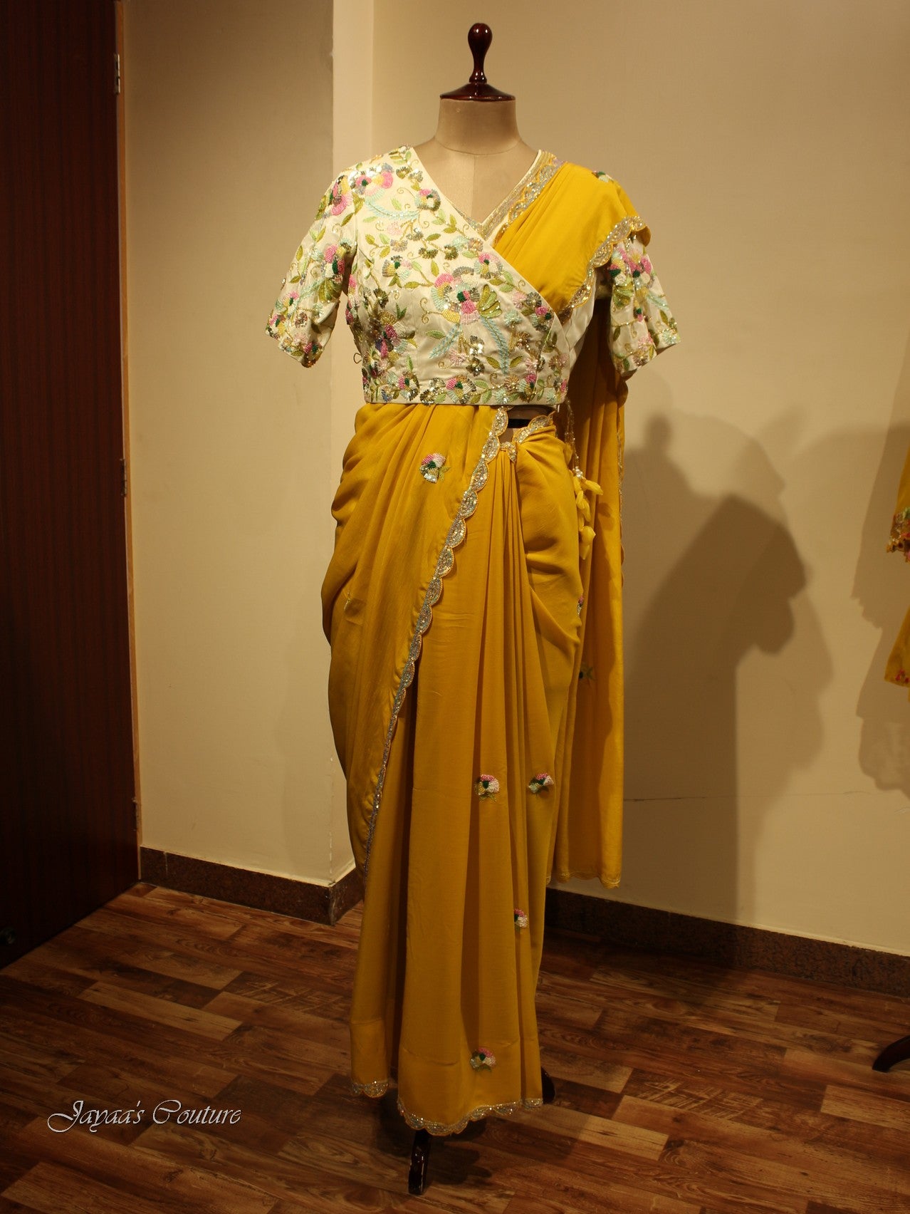 Yellow saree with off white blouse