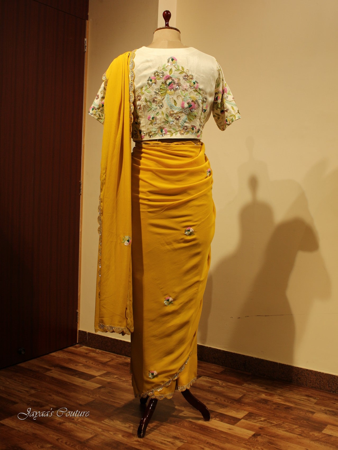 Yellow saree with off white blouse