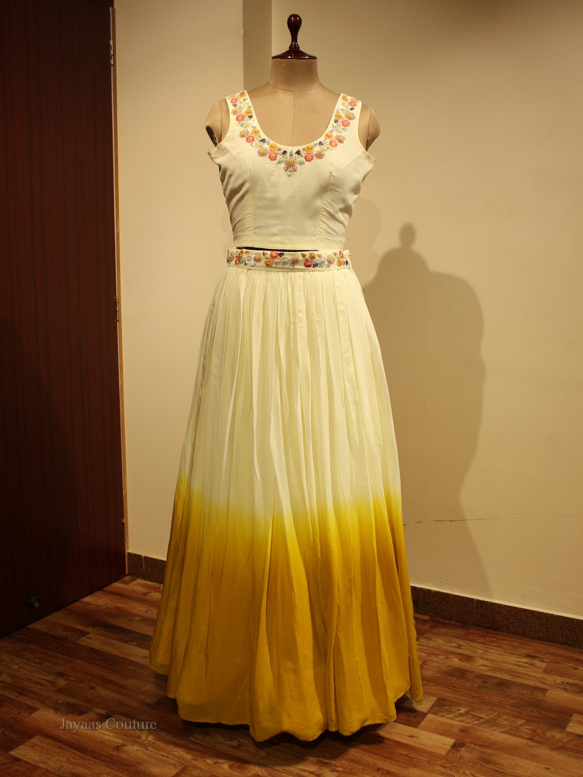 Off yellow shaded crop top with skirt and cape