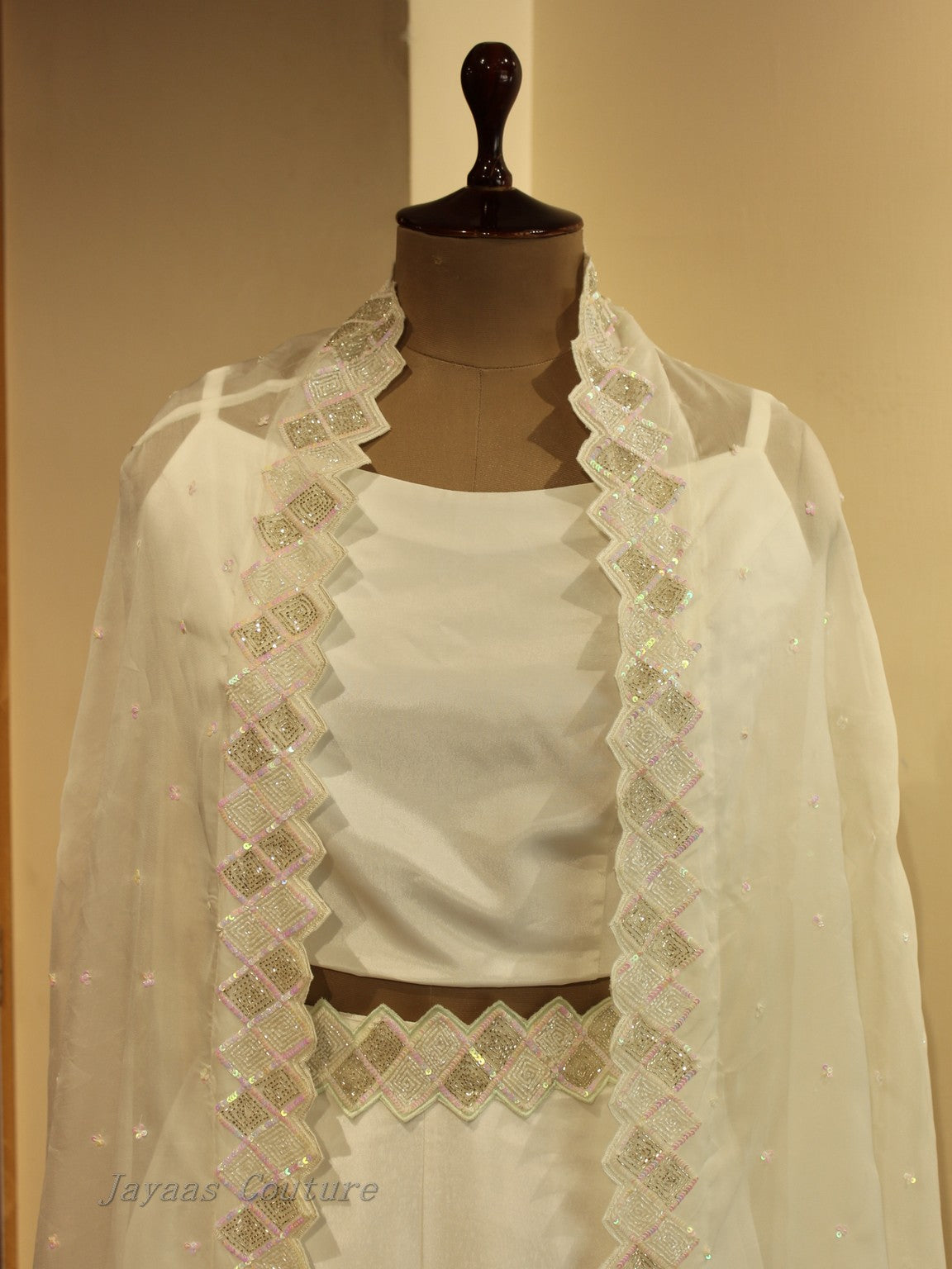 White embroidered cape with crop to and skirt