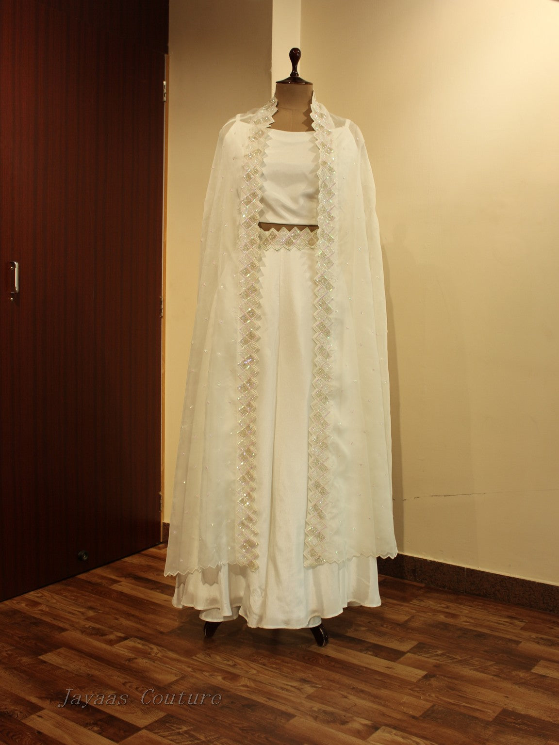 White embroidered cape with crop to and skirt