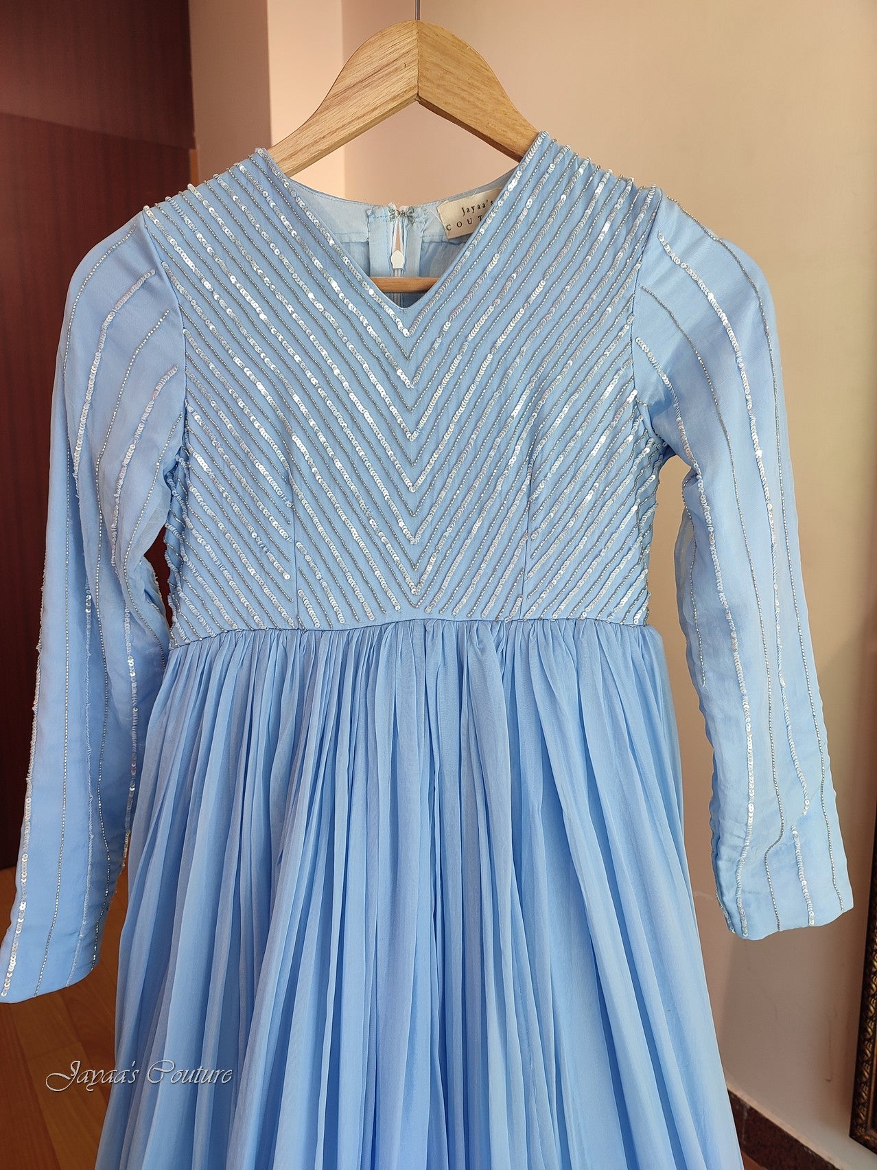 Powder blue pleated gown