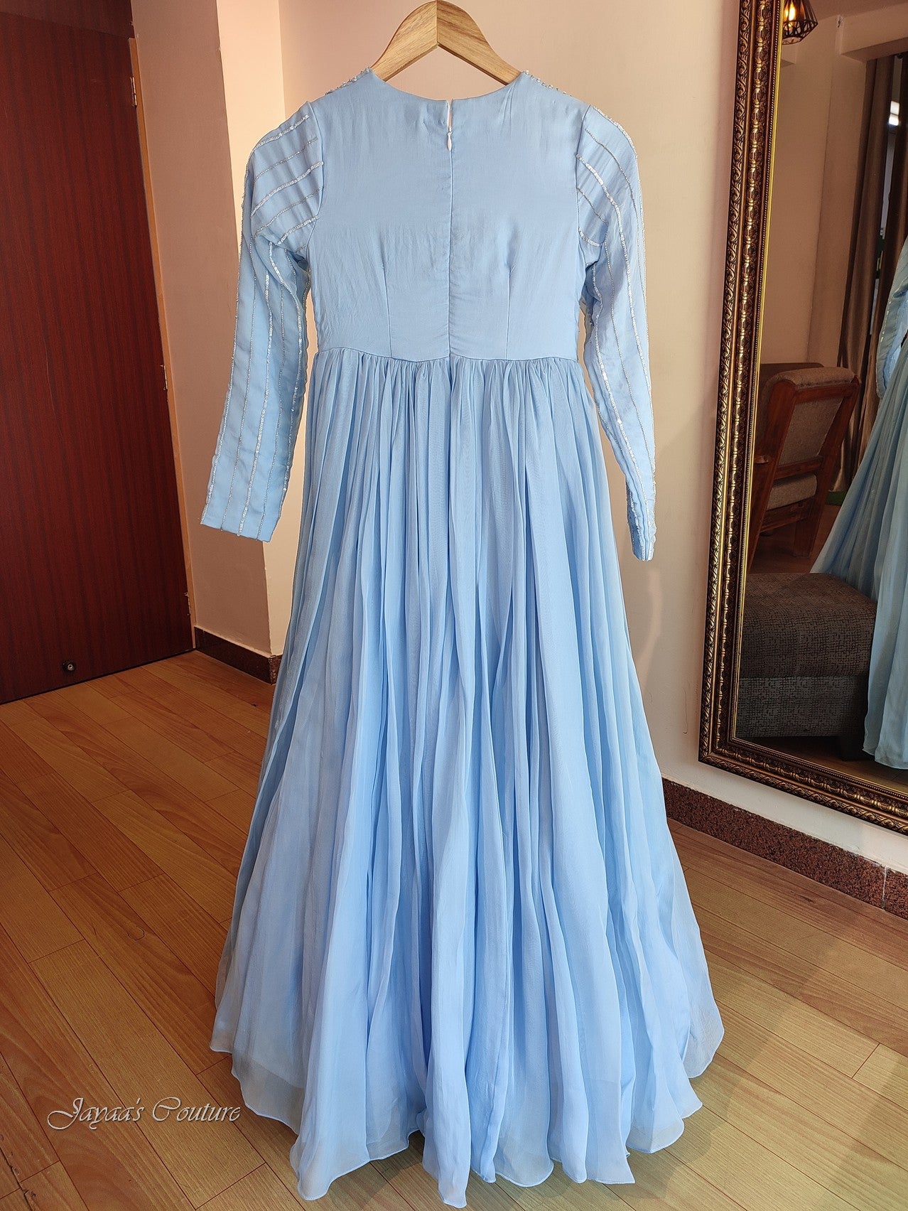 Powder blue pleated gown