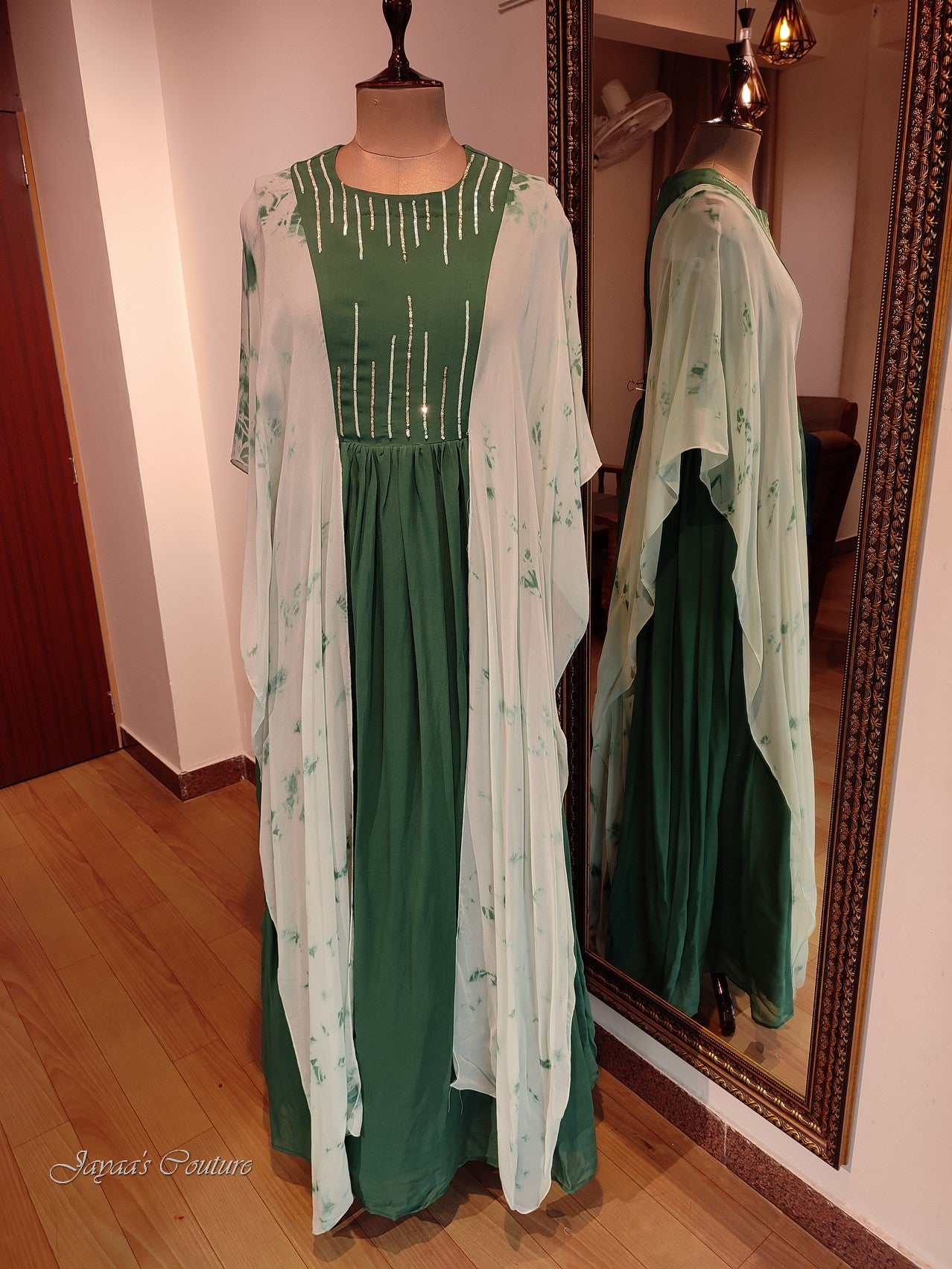 Green gown with toe and dye drape sleeves