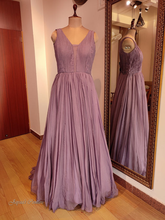 Mauve pleated gown with belt