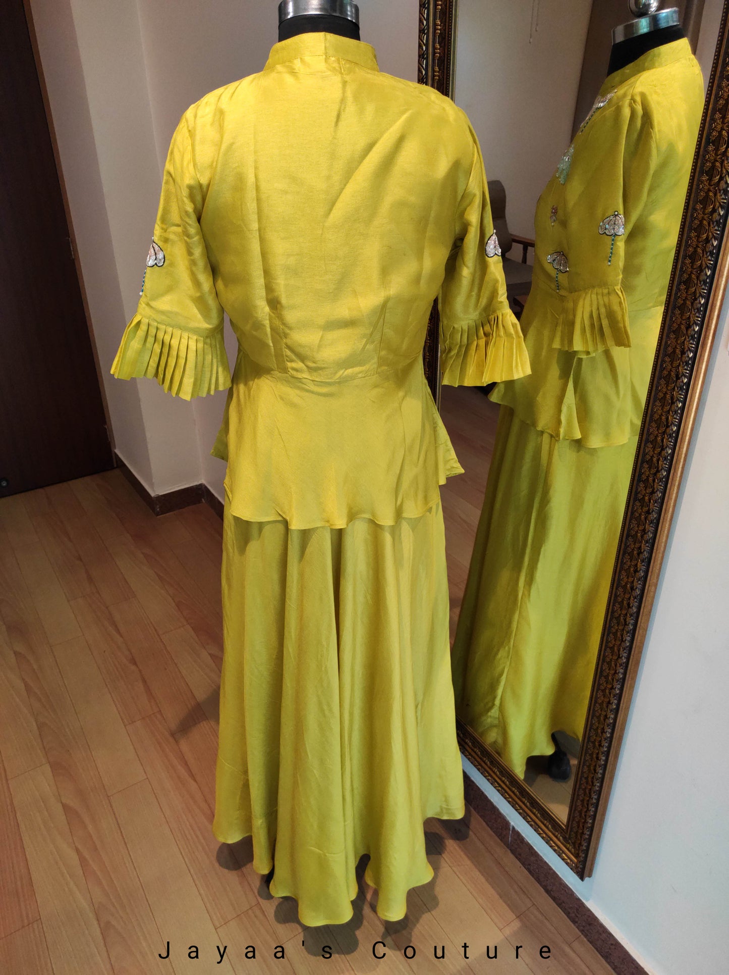 Greenish yellow gown with peplum jacket