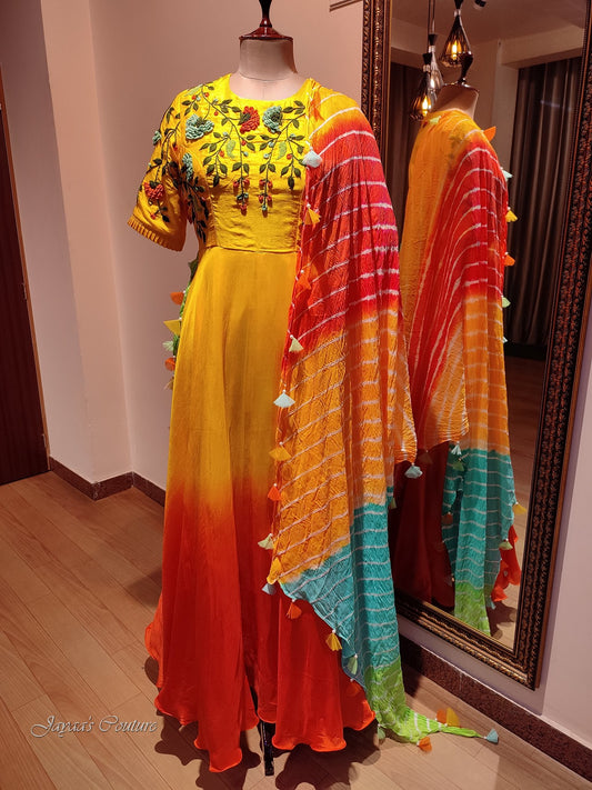 Shaded orange gown with leheriya dupatta
